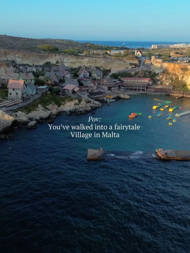 You need to add this spot to your Malta Bucket List 😍Before we dive in, don’t forget to save this and follow for more daily travel Inspiration ✈️This spot is in the north of the island, in Mellieha, and we come here quite a lot. Popeye Village is actually the old movie set from the 1980 Popeye film, and it’s still standing today.The entrance is around €15 in low season and €25 in high season, and walking inside feels a bit like stepping into a quirky little movie world.  You can also enjoy it from the outside; the view from the cliffs is beautiful. If you walk down a bit, there’s a platform where you can swim, and the whole place looks amazing at sunset. It’s one of those areas we always enjoy coming back to. 🌅Is Popeye Village on your bucket list? 🎥✈️